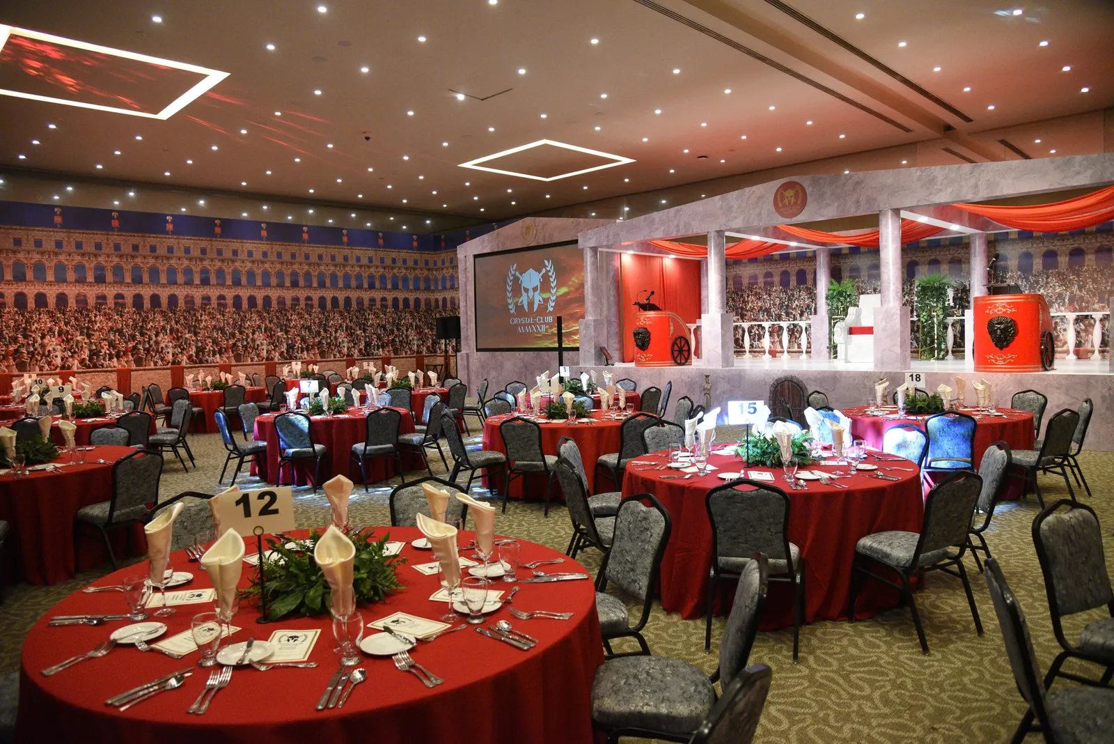 Themed corporate gala dinner and awards event set-up in a hotel ballroom