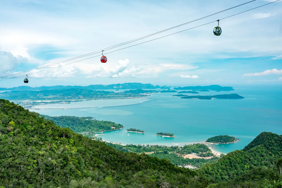 Langkawi SkyCab cable car with aerial view of islands and turquoise sea